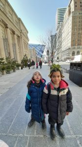 Alexandria and Sebastian standing outside the Royal Ontario Museum.